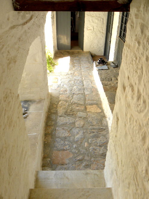 Second covered marble staircase connecting the first floor terrace and the courtyard