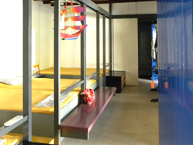 Bedroom with four beds on the first floor